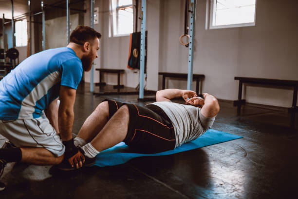 istock Overweight Male Doing Abdominal Exercises To Lose Weight 1139916317