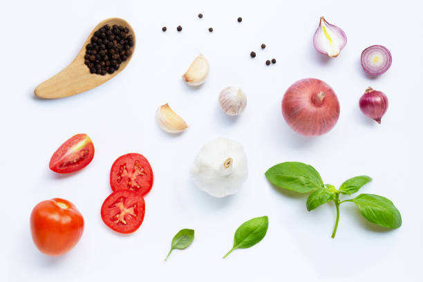 istock Various fresh vegetables and herbs on white background. Healthy eating concept 1139919164