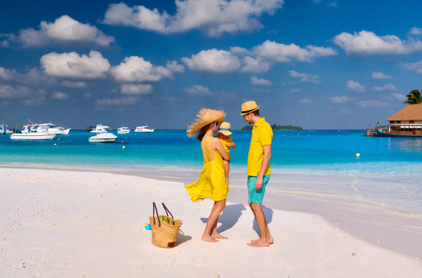 istock Family with three year old boy on beach 1139924734