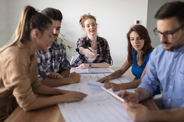 istock Image of business partners discussing documents and ideas 1139928971