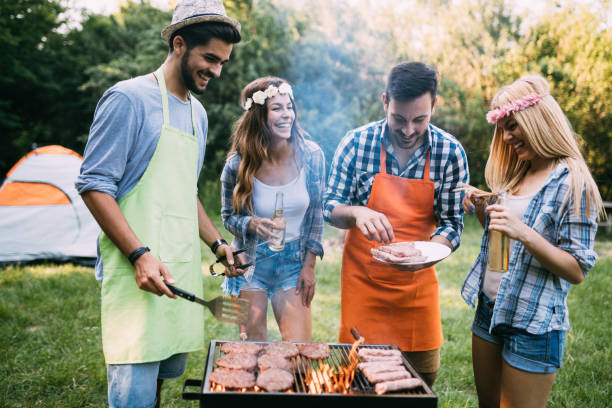 istock Friends spending time in nature and having barbecue 1139931009