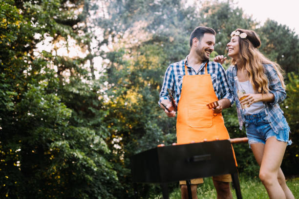 istock Beautiful woman and handsome man having barbecue 1139931020