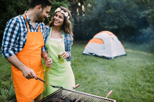 istock Beautiful woman and handsome man having barbecue 1139931039