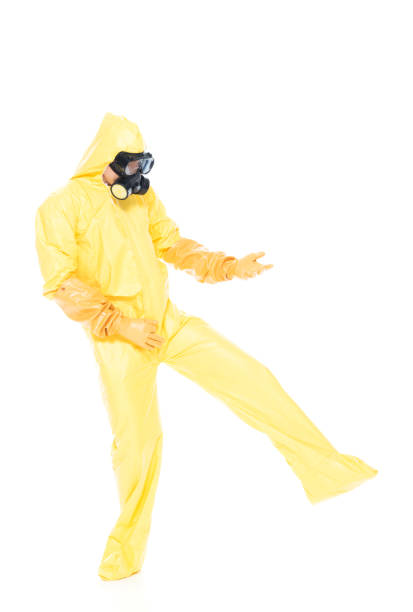 istock Man in protective clothing doing air guitar 1139941016