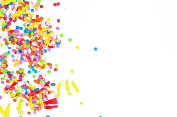 istock Colorful assorted confetti with serpentine on white 1139943824