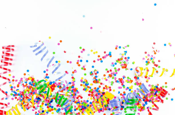 istock Colorful assorted confetti with serpentine on white 1139944272