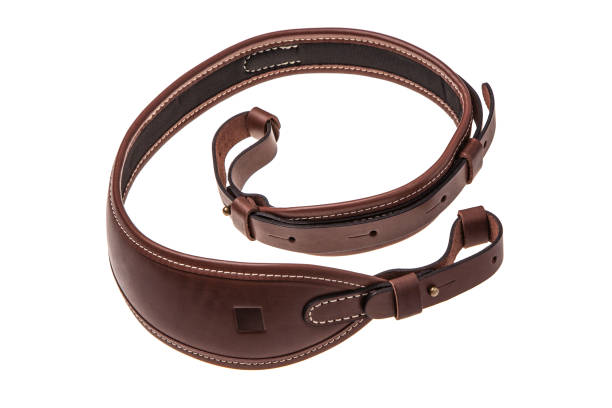 istock leather shoulder strap for a gun isolated on white background 1139944318