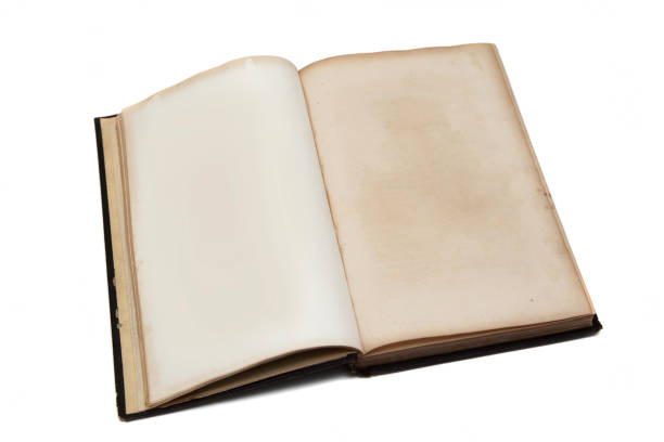 istock Old vintage book with yellowed aged pages isolated on white background.  Open book mockup 1139944462