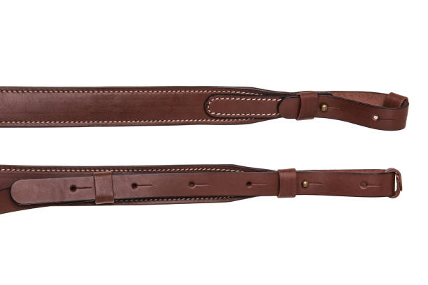 istock leather shoulder strap for a gun isolated on white background 1139944482