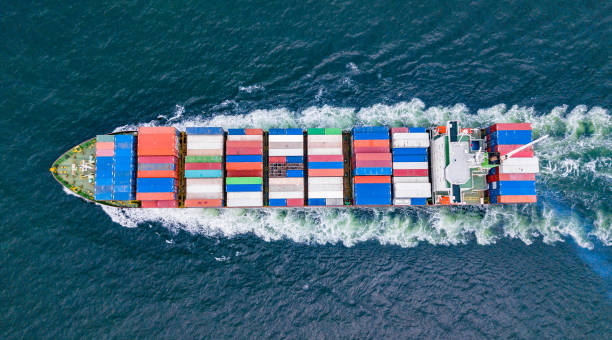 istock Cargo ships with full container receipts to import and export products worldwide Singapore 1139944496