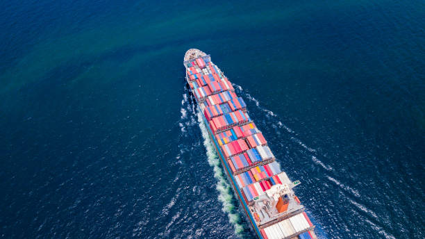 istock Cargo ships with full container receipts to import and export products worldwide Singapore 1139944509