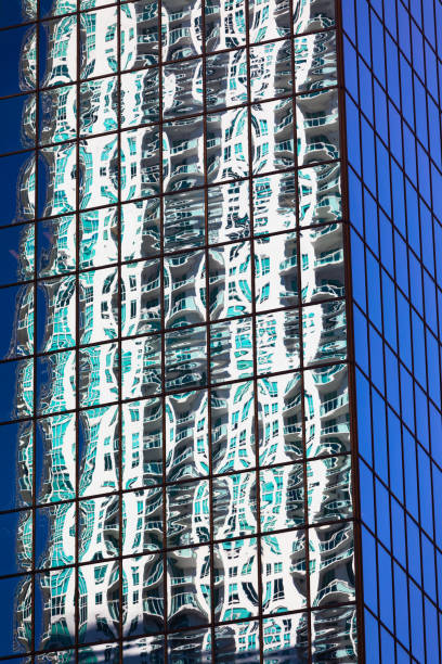istock Reflections on glass buildings 1139944558