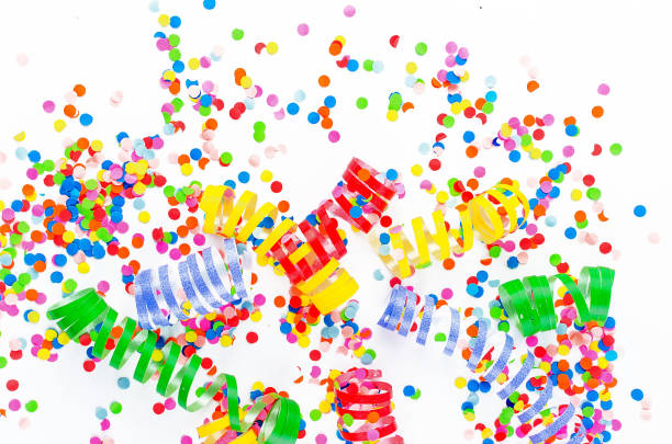 istock Colorful assorted confetti with serpentine on white 1139944568