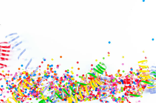 istock Colorful assorted confetti with serpentine on white 1139944616