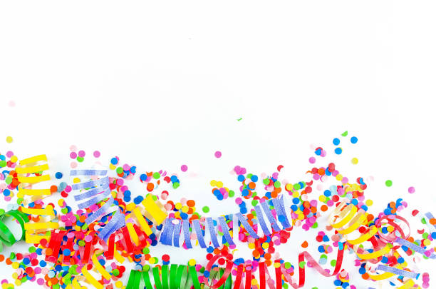 istock Colorful assorted confetti with serpentine on white 1139948071