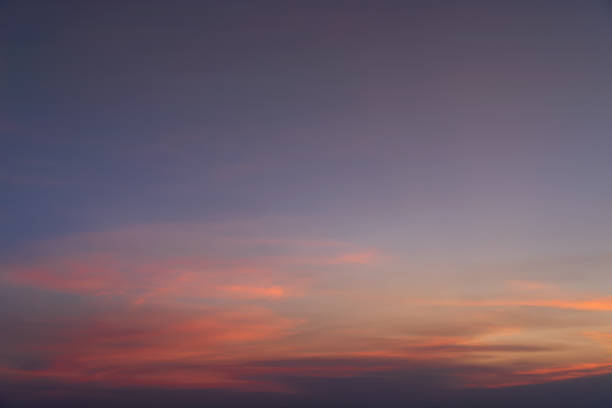istock Abstract nature background. Dramatic blue sky with orange colorful sunset clouds in twilight time. 1139949878