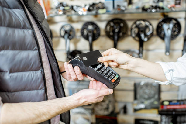 istock Paying with card at the bicycle shop 1139950267