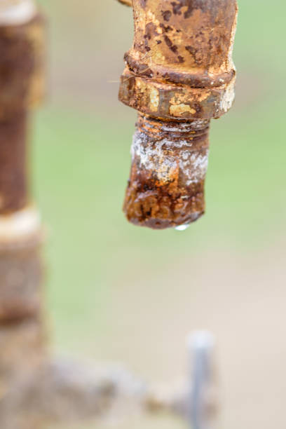 istock Old rusty tap with a drop of water. 1139950484