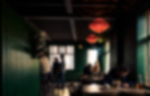 Defocus image of Coffee Shop or Cafeteria. Blurred background made with Vintage Tones.