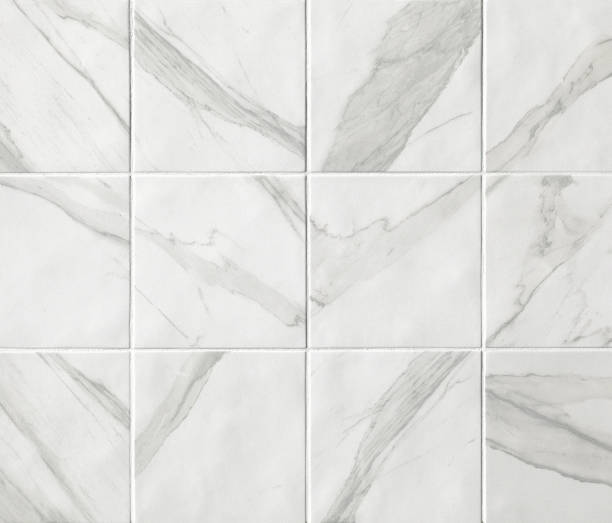istock White marble mosaic tiles texture background. Marble tiles with natural pattern. 1139953327