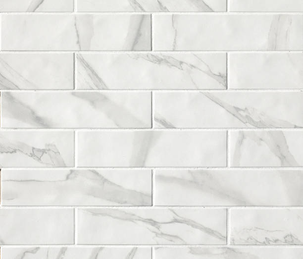 istock White marble mosaic tiles texture background. Marble tiles with natural pattern. 1139953333