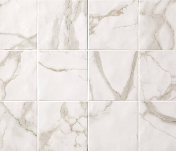 istock Light beige marble mosaic tiles texture background. Marble tiles with natural pattern. 1139953344