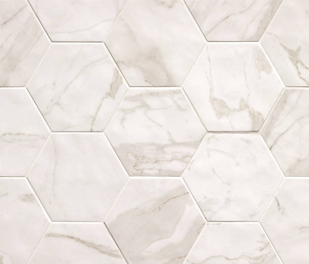 istock Light beige hexagonal marble mosaic tiles texture background. Marble tiles with natural pattern. 1139953358