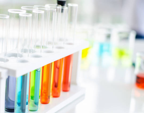 istock A pipette dropping sample into a test tube,abstract science background 1139957610