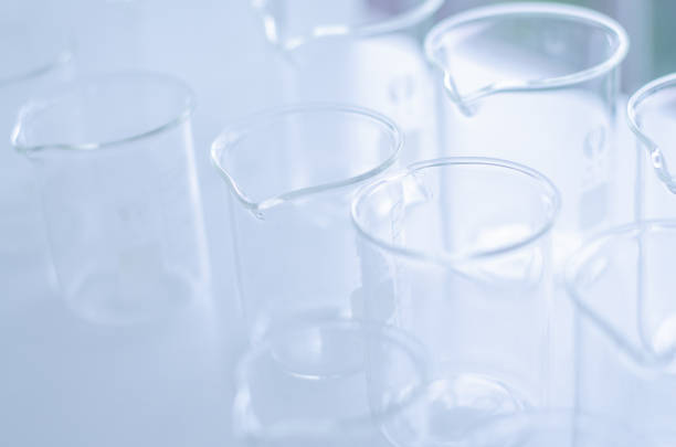 istock A pipette dropping sample into a test tube,abstract science background 1139957621