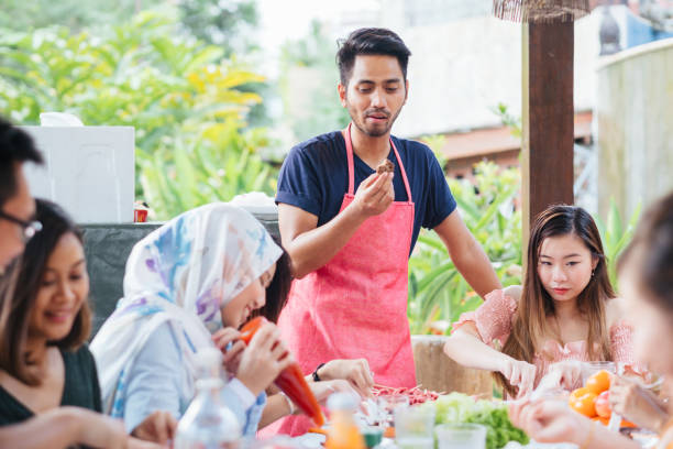 istock Group of Friends Having Meal Together 1139959578