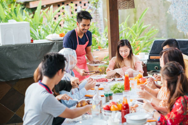 istock Group of Friends Having Meal Together 1139959582