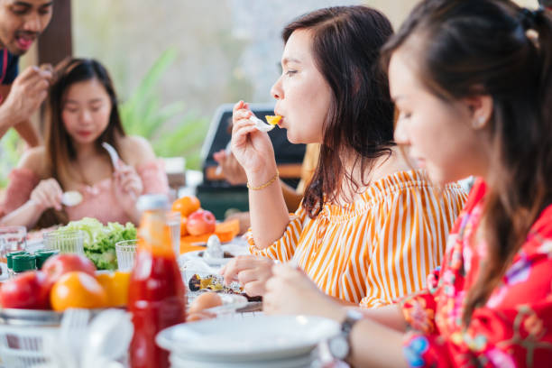 istock Group of Friends Having Meal Together 1139959591
