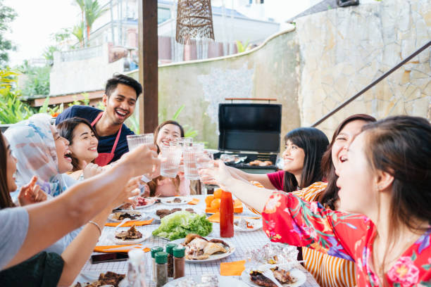 istock Group of Friends Toasting During Barbecue Party 1139959603