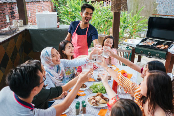 istock Group of Friends Toasting During Barbecue Party 1139959650