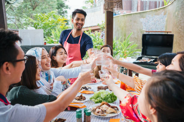 istock Group of Friends Toasting During Barbecue Party 1139959672