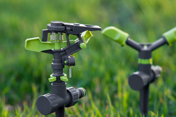 istock Garden grass irrigation water sprinklers 1139962215