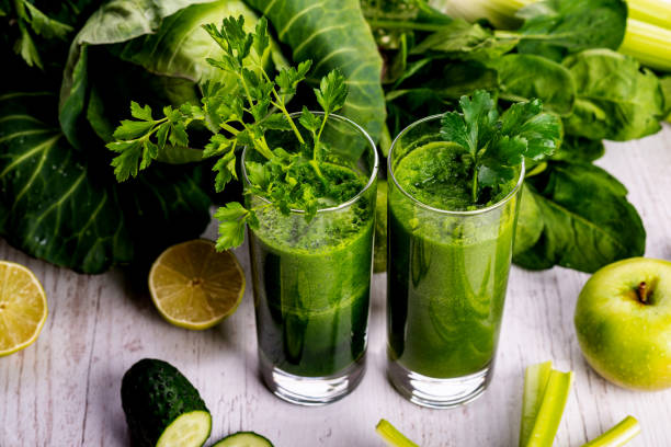 istock Healthy smoothie for breakfast with green spinach and apple. 1139963606