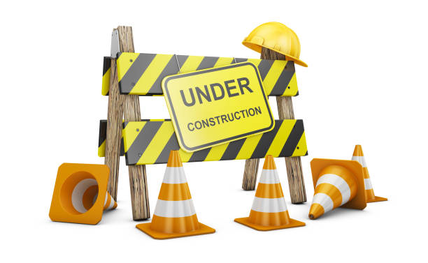 barrier Under construction Road barrier with the words Under construction. 3d render. rebuilding stock pictures, royalty-free photos & images