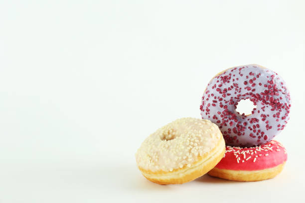 istock Minimal composition in vibrant colors with bright glaze donuts. 1139971225