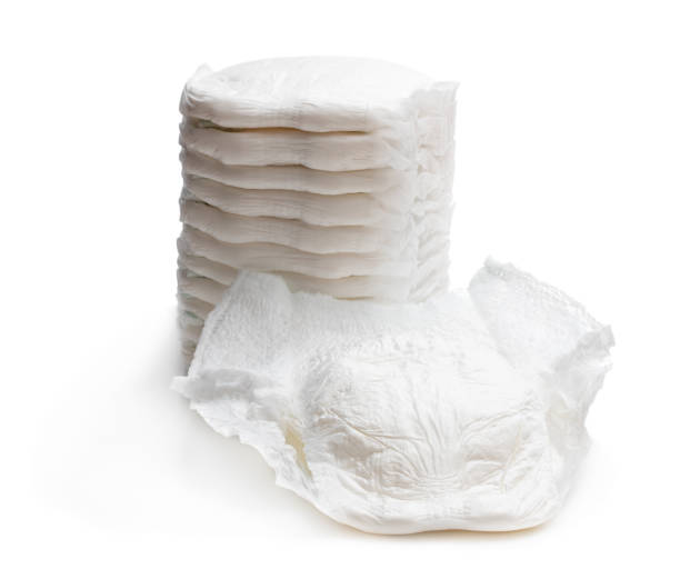 istock Stack of adult diapers isolated on white 1139971263