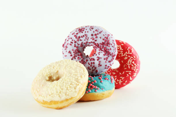 istock Minimal composition in vibrant colors with bright glaze donuts. 1139971335
