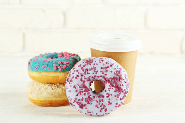 istock Minimal composition in vibrant colors with bright glaze donuts. 1139971882
