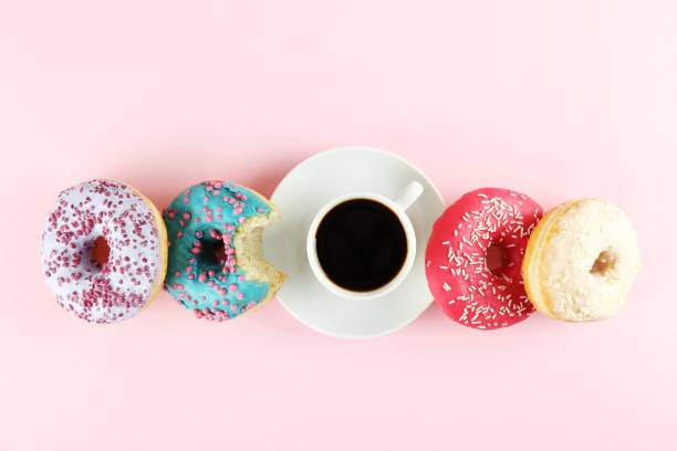 istock Minimal composition in vibrant colors with bright glaze donuts. 1139971922