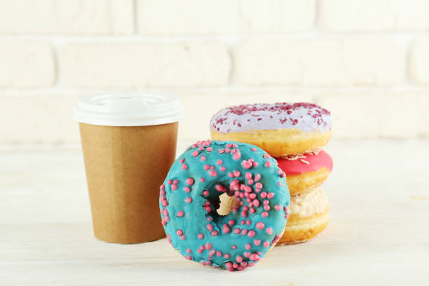 istock Minimal composition in vibrant colors with bright glaze donuts. 1139971928