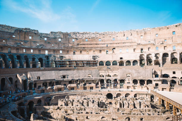 istock Colosseum background blue sky in Rome, Italy 1139975021
