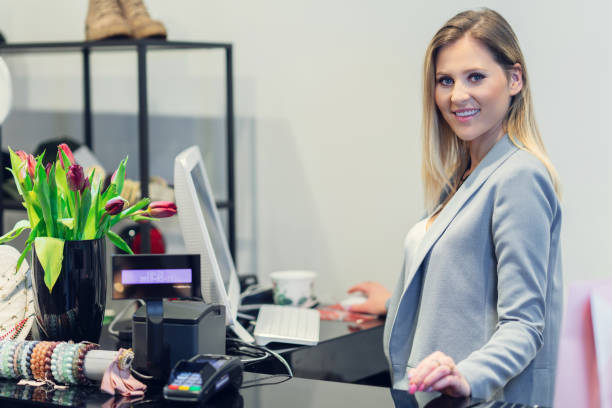 istock Sales assistant in clothing store 1139980240