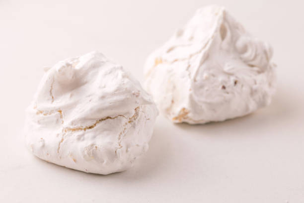 istock dessert. French meringues with nuts, pistachios 1139987012