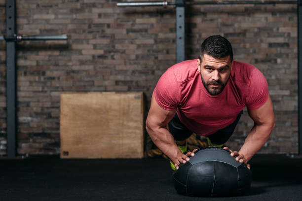 380+ Medicine Ball Push Up Stock Photos, Pictures & Royalty-Free Images ...