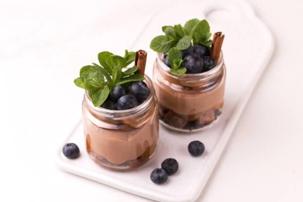 istock Cake dessert. Chocolate mousse with blueberry, mint and cinnamon 1139987300