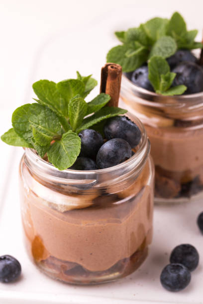 istock Cake dessert. Chocolate mousse with blueberry, mint and cinnamon 1139987406